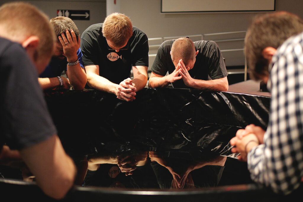 Men praying